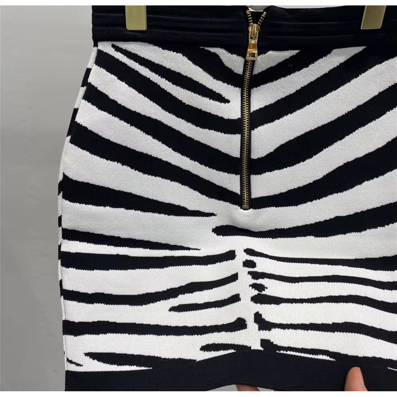 Knit material zebra mini skirt. classy, zebra mini skirt.